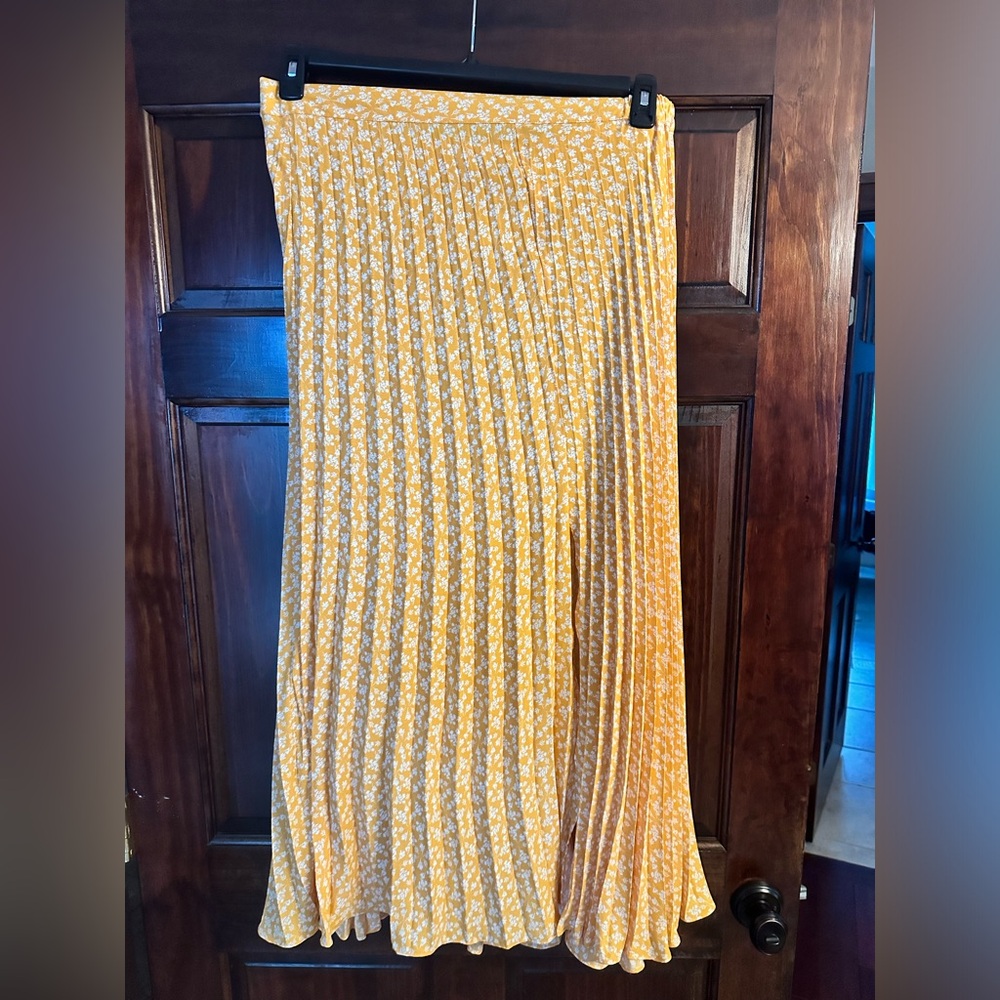 Yellow pleated full length skirt